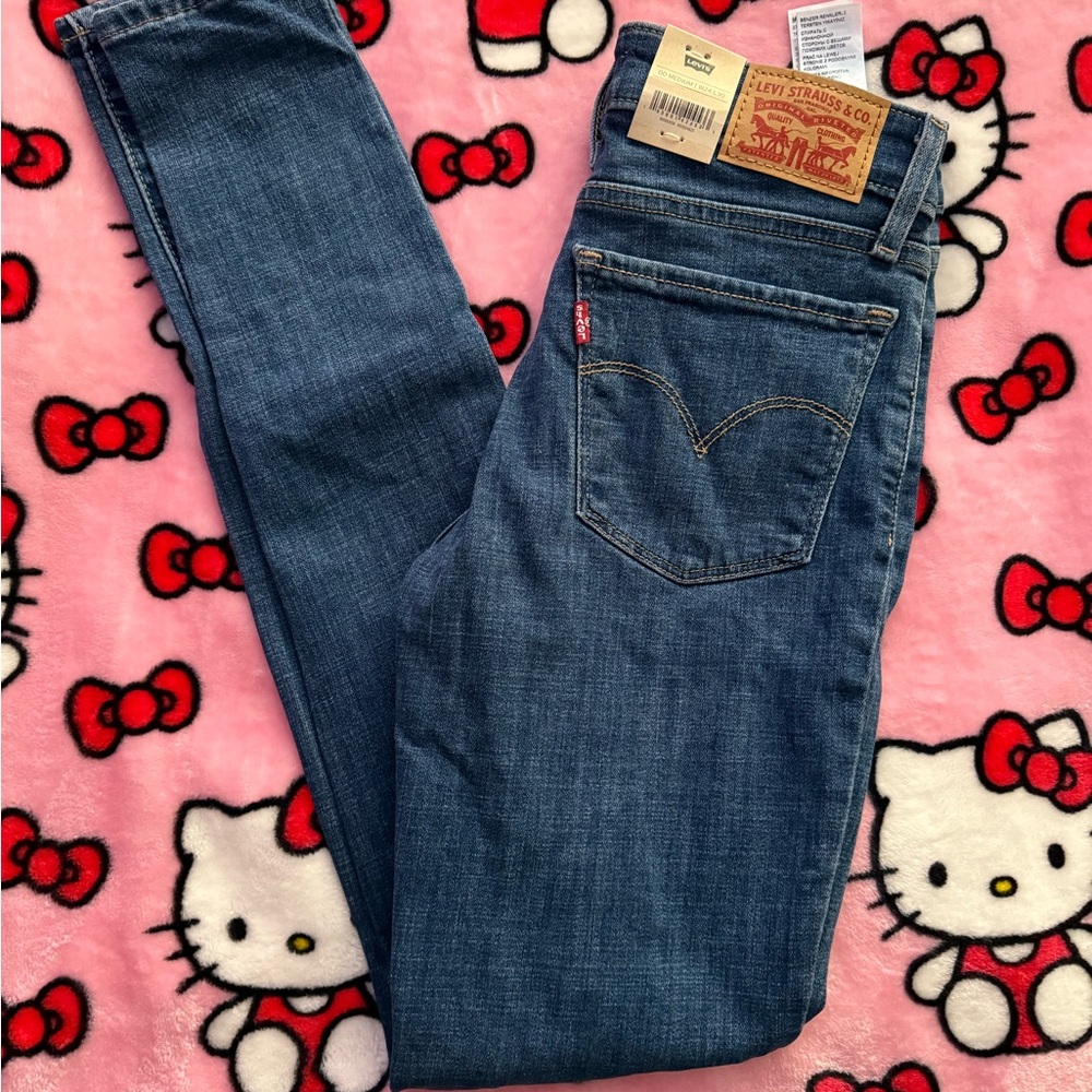 Stylish Blue Distressed Women's Jeans - Picture 2 of 3